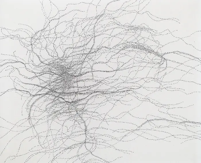 schwarze Punkte auf weißem Papier