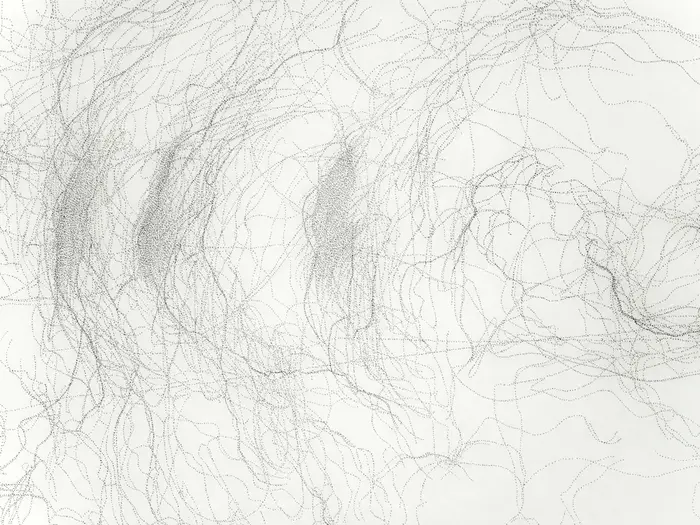 schwarze Punkte auf weißem Papier