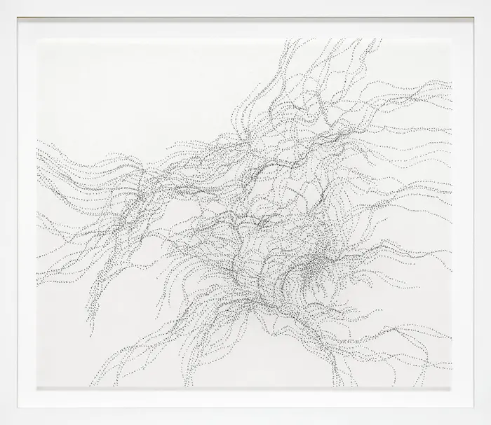 schwarze Punkte auf weißem Papier