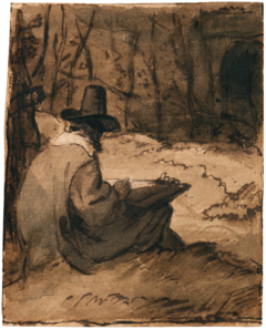 zeichnender Mann mit Hut, der unter einem Baum sitzt