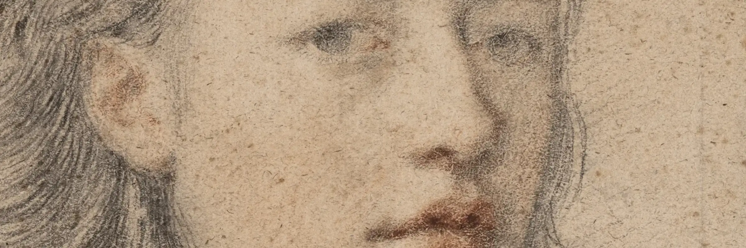 Die Porträt-Zeichnung eines Jungen mit kinnlangen Haaren.