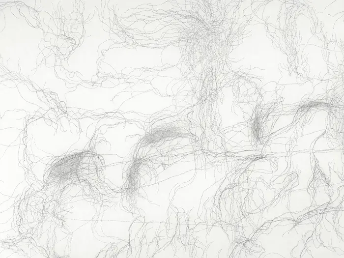 schwarze Punkte auf weißem Papier